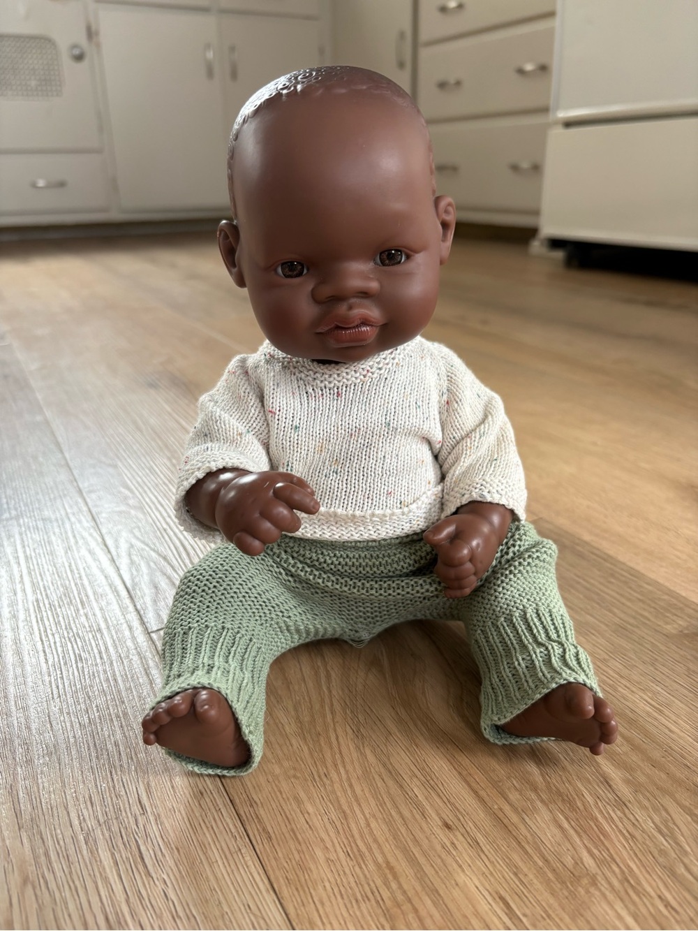 Miniland Anatomically correct African Black Baby Doll with Knit clothing - Picture 2 of 5